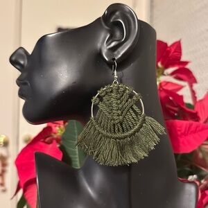 Beautiful hunter green long earring.